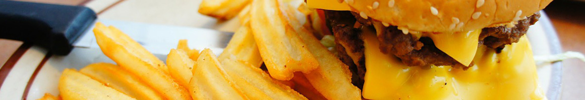 Eating American (Traditional) Burger at Tastee Top Grill restaurant in Cedar Lake, IN.